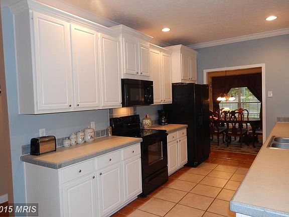 Kitchen w/Tile Floor, shows door to Dining Rm