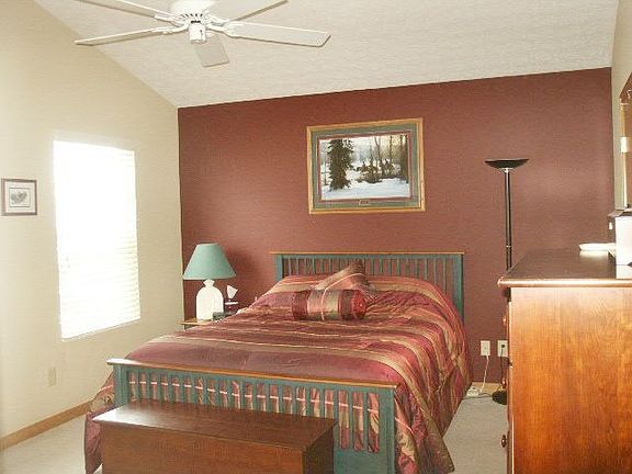 Master Suite that features Vaulted Ceiling, Private Bath and Walk-in Closet