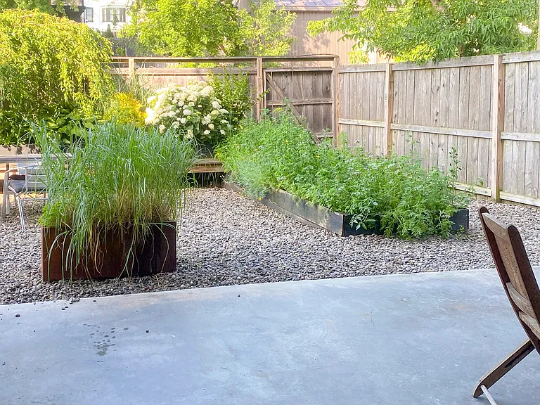 Private covered porch off communal garden