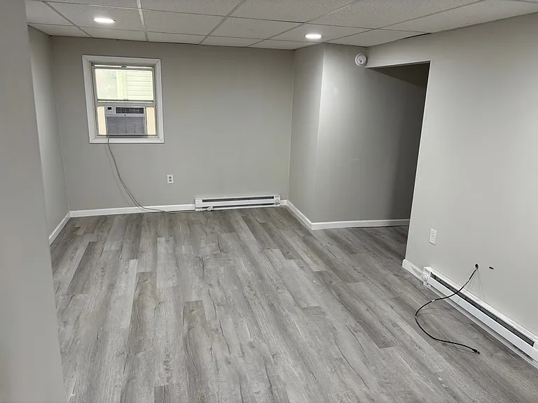 Living Room. Kitchen entrance on right