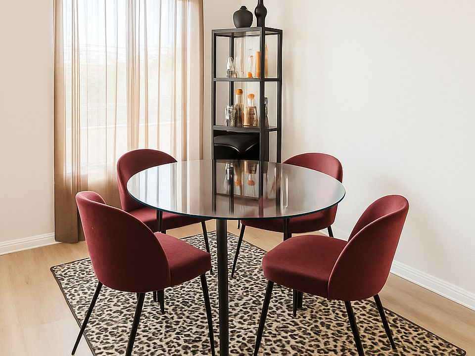Dining room with bright natural light.