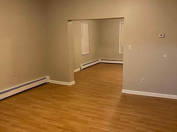 Dining room (foreground) and living room (background)