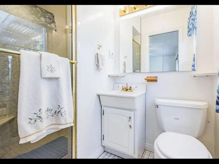 Ensuite bathroom in larger upstairs bedroom (sink has been changed)
