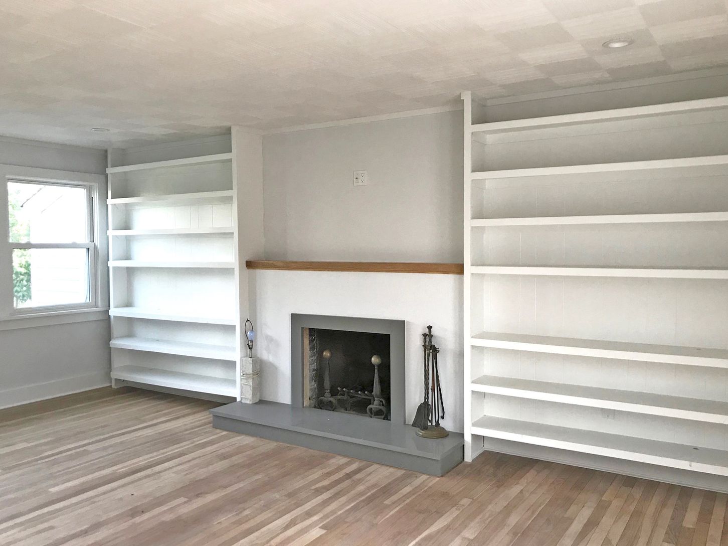  Owner's Unit, Renovated Living Room with Fireplace and Built-In Bookshelves