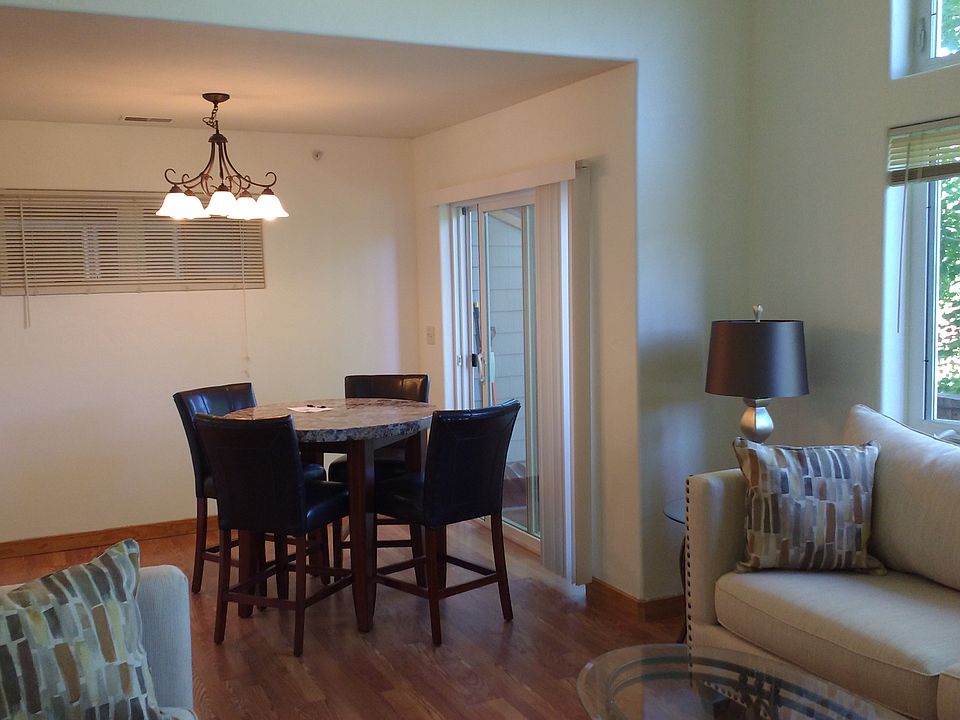 open floor plan, outdoor deck with grill off of dining room