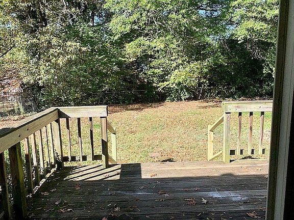 Spacious backyard w/deck