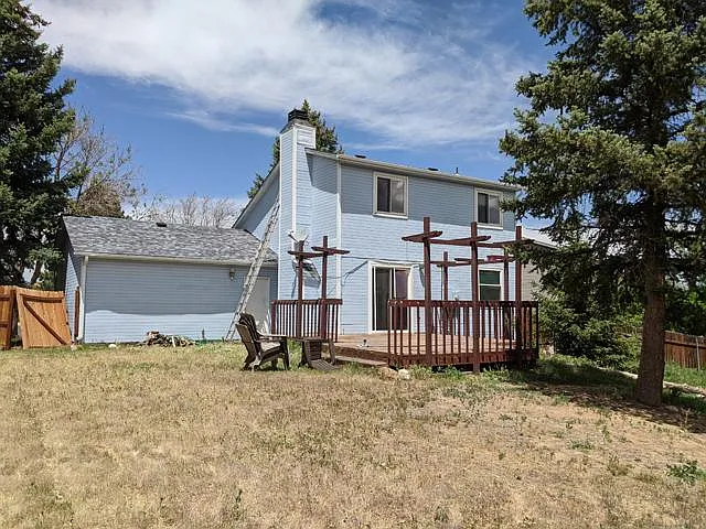 Large yard and deck.