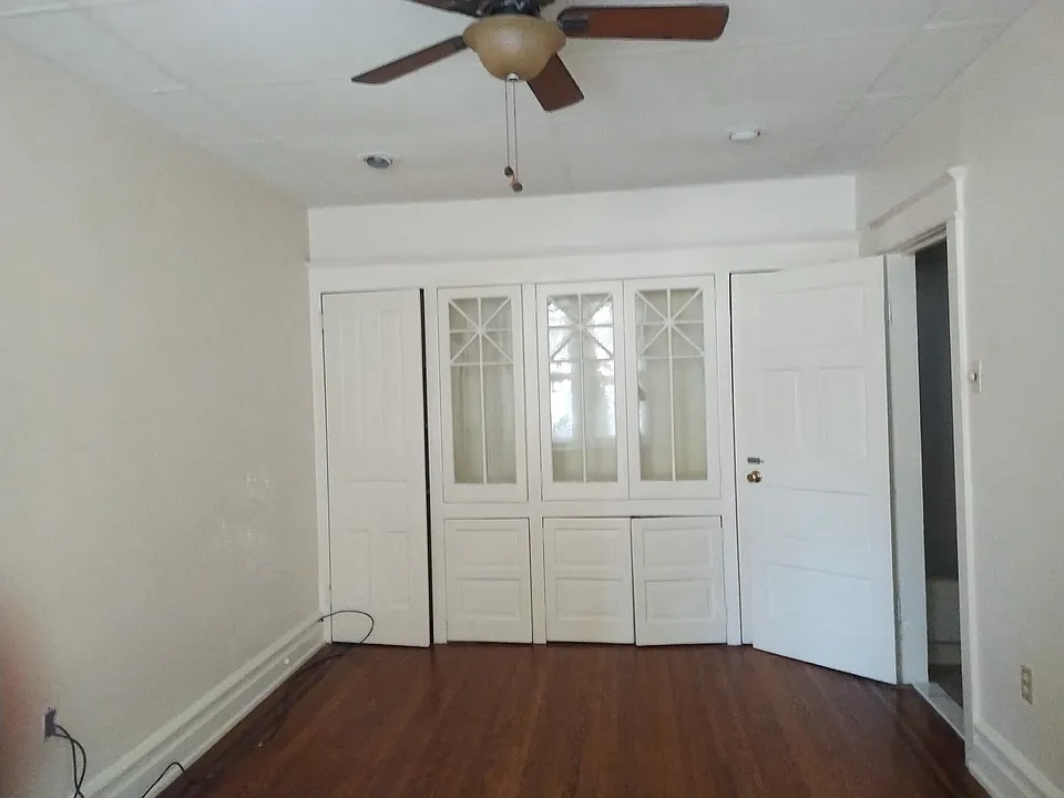 Living room with plenty of built in storage!