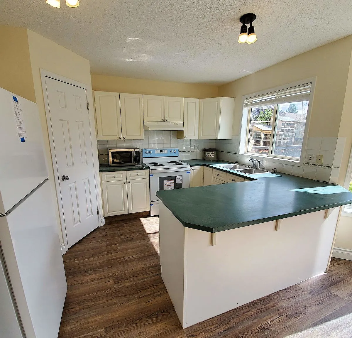 3+1 bedroom home in the community of Citadel — Photo 4
