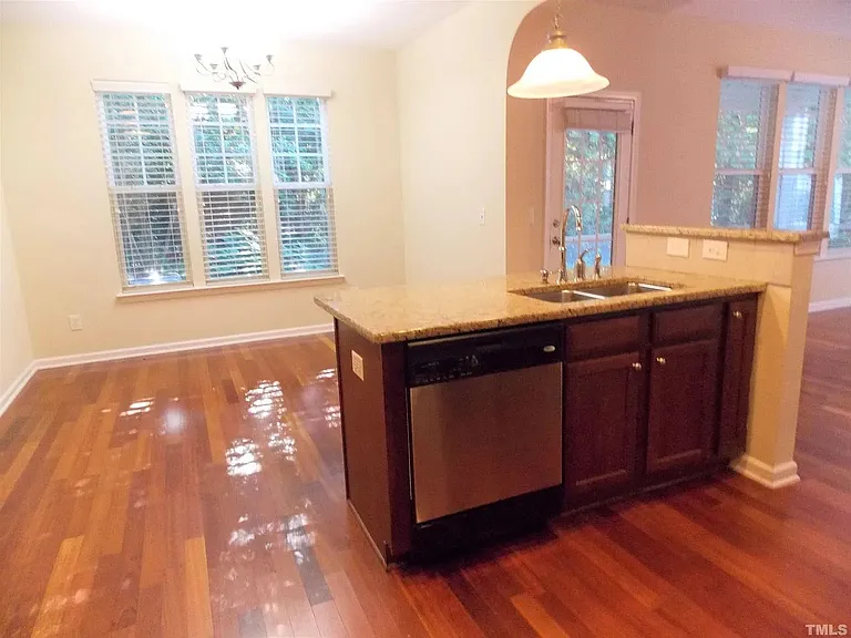 Granite kitchen island with barstool seating
