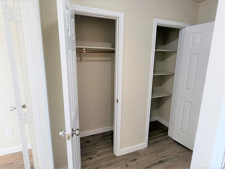 Coat closet and linen closet for extra storage.