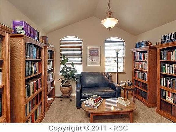 full library with view of the living room