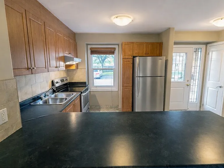 7591 Scholfield Rd — Photo 32