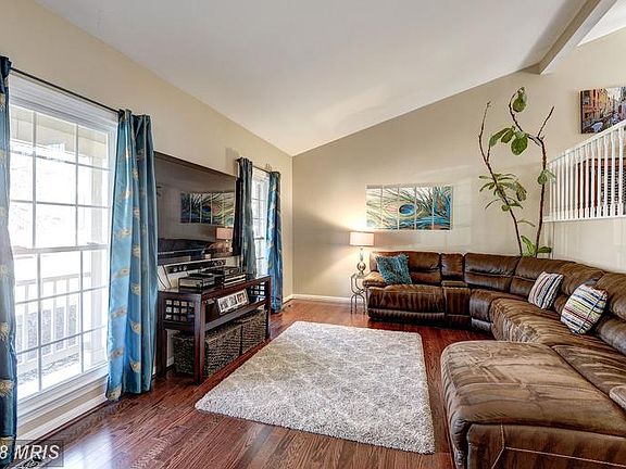 LIVING RM - LGE WINDOWS ALLOW IN LOTS OF SUNLIGHT!