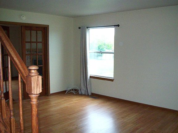 Living room w/ french doors to family room
