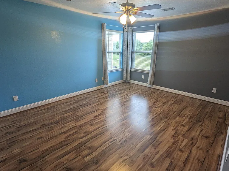 Master bedroom facing back of the house.