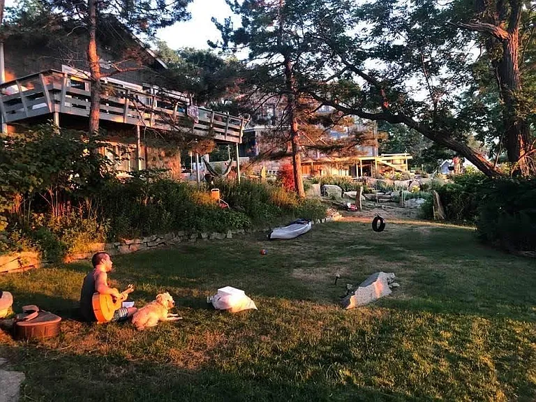 Lawn between house (seen on left of photo) and ocean