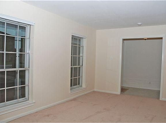 Neutral formal living room ready for your personal touch.
