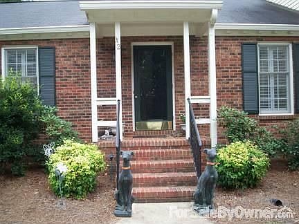 Brick front. Landscaping done by HOA