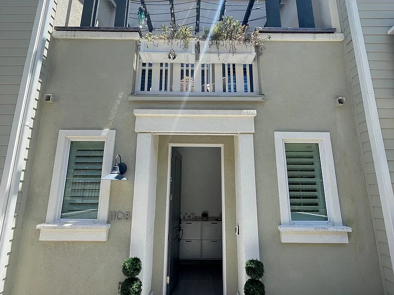 Gated courtyard at front door.