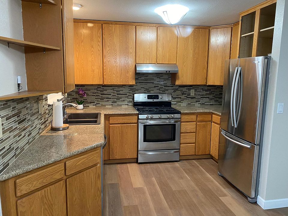Kitchen with stainless steel appliances and granite countertops