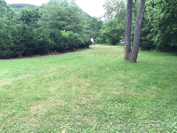 View of Stone patio and Fire Pit
						:
						Deck and firepit area perfect for entertaining.