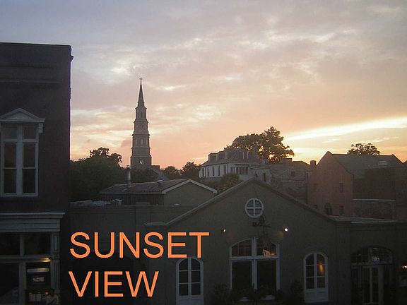 View out Windows of Rooftops & Steeples