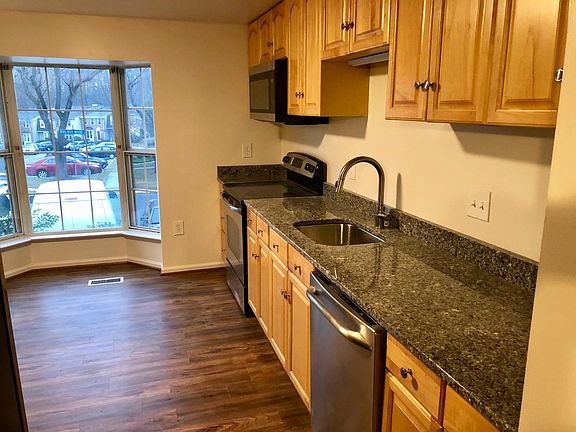 updated kitchen - luxury vinyl planking, granite, stainless 