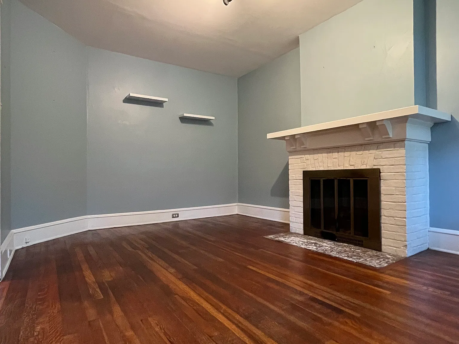 Large living room with fireplace.