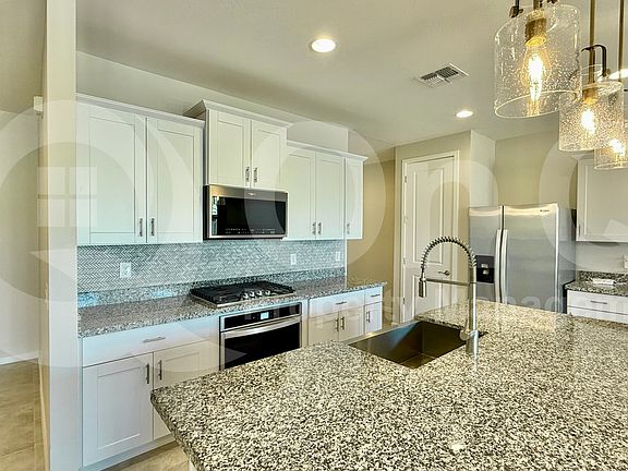 4th image of 5642 W Rainwater Dr