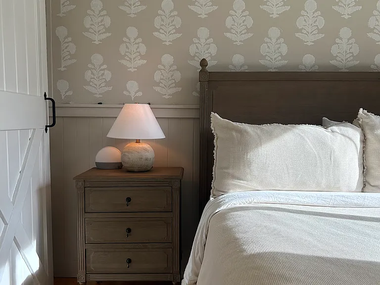 2nd Bedroom Fits a Queen Size Bed and has a hand-painted "wallpaper."