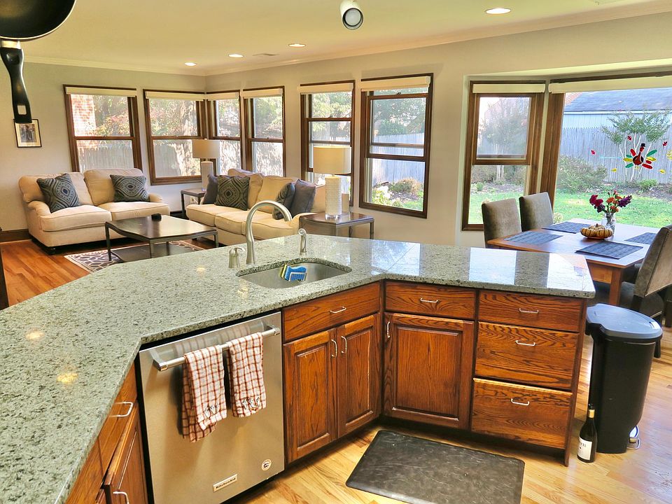 Kitchen island, family room, and breakfast nook.