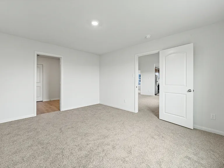 The master suite of the Sabine has a large bedroom, en-suite bathroom and a spacious walk-in closet.