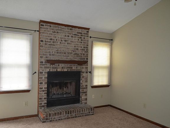 Fireplace in l.r., cathedral ceiling with fan