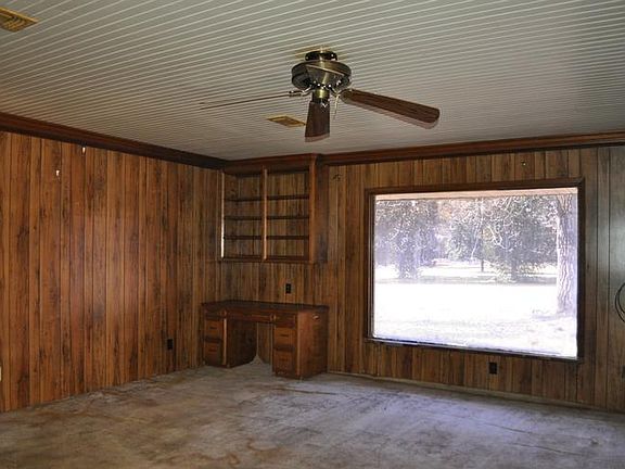 Living room with fireplace and desk