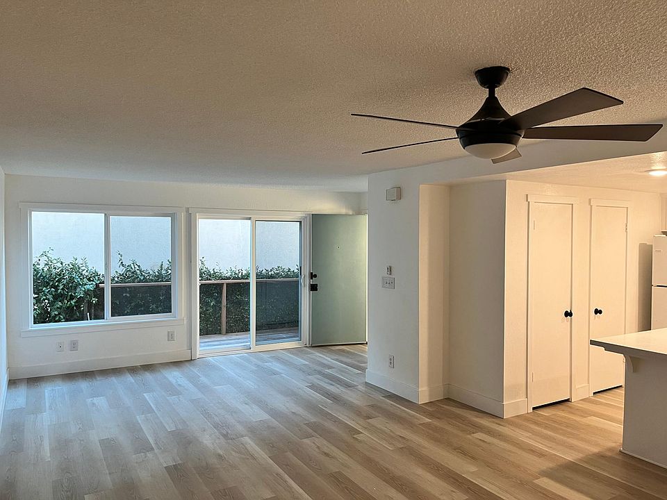 Living room with front door open