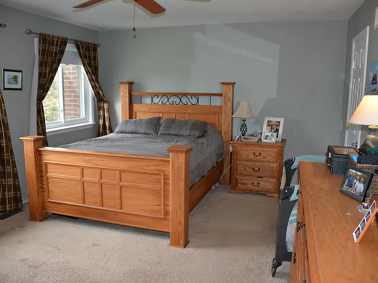 Primary bedroom with furniture