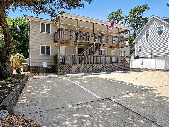 Front of the Property with designated parking.