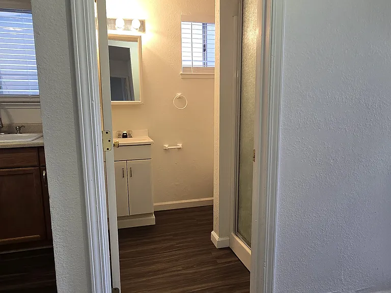 hallway looking into bathroom