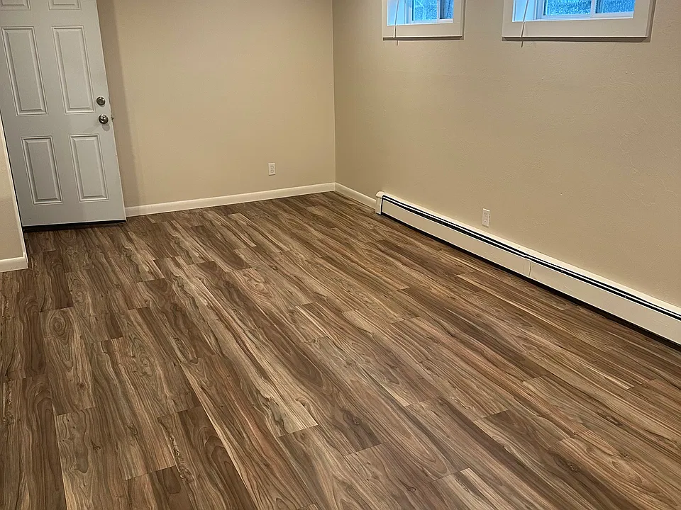 Living room, looking towards front door.
