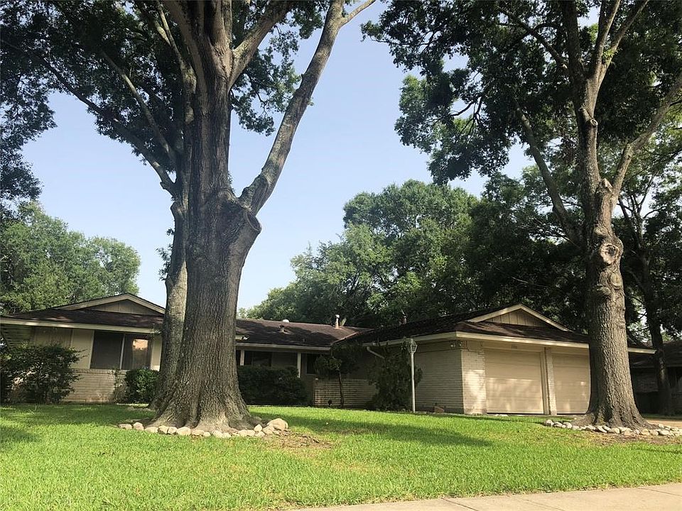 Treelined streets make this charming neighborhood easy to want to call home.