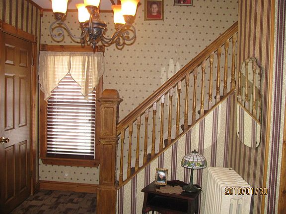 Stunning wood work surrounds the front entry