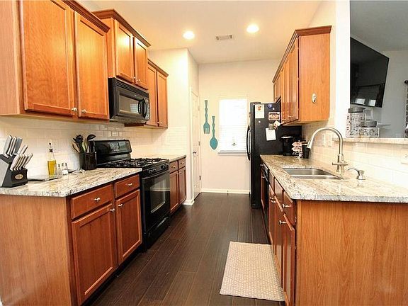 kitchen with upgrades and plenty of storage