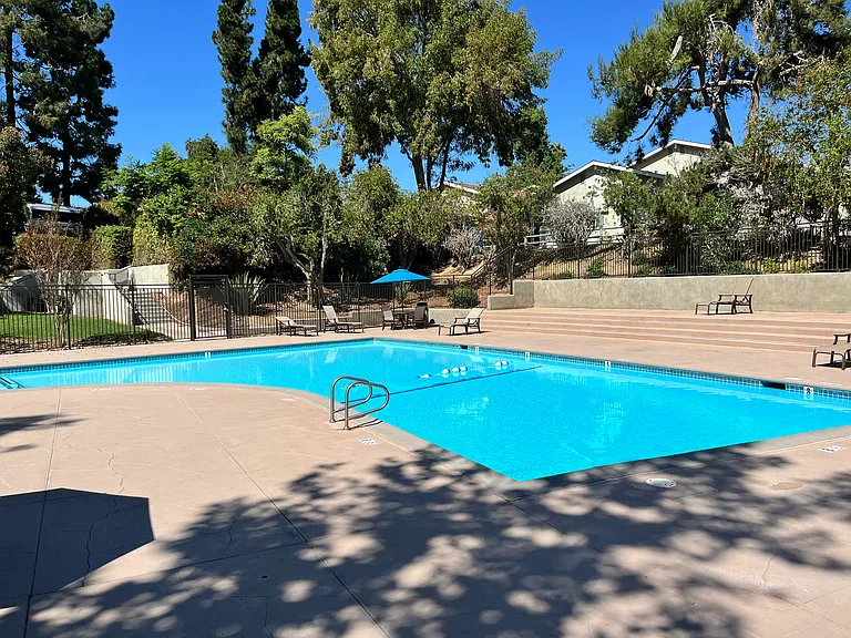 Large, gated pool and lounge area