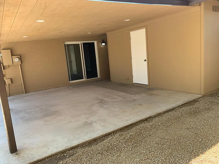 Patio includes outdoor lighting to entertain! The doorway leads to the laundry room outside (NOT included in square footage, so extra room for you!)