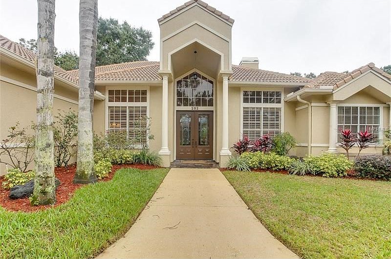 Custom home with many architectural features