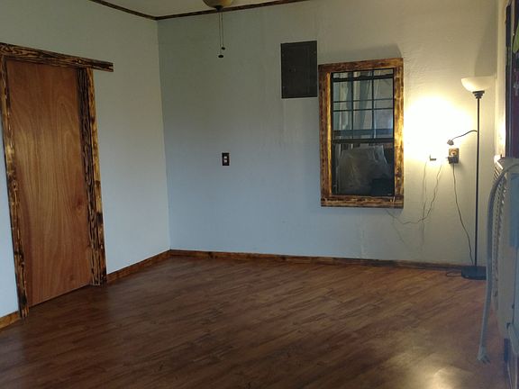 bedroom door off front room