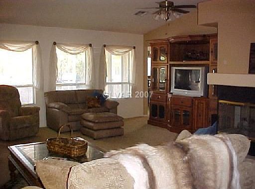 bright open liv room w/2 way fireplace