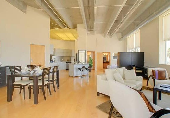 Spacious Living Area w/hardwood floors throughout