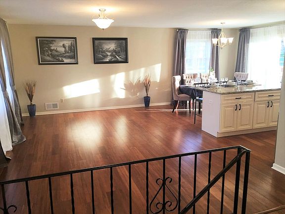 Lots of windows with elegant window treatments